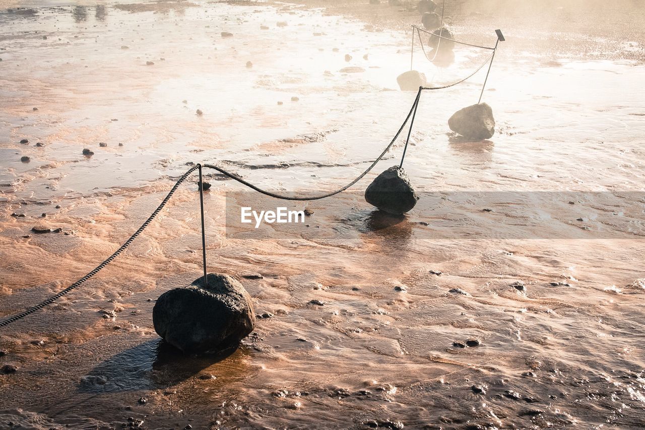 High angle view of fence on strokkur geyser