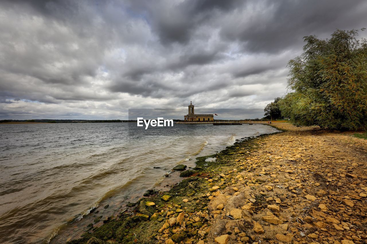 Scenic view of beach against sky