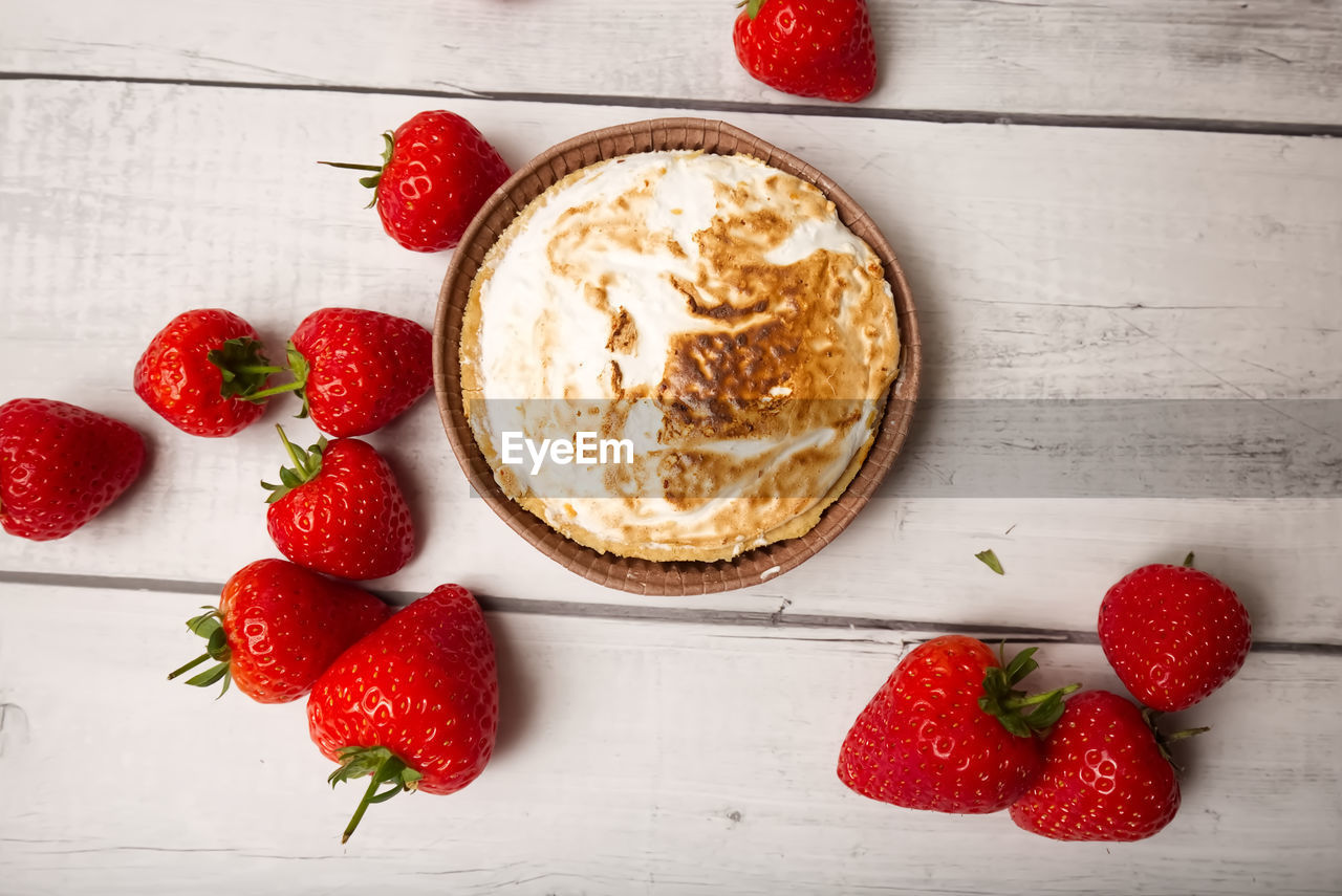 strawberry, food and drink, food, berry, healthy eating, fruit, freshness, red, plant, dessert, wellbeing, wood, produce, indoors, studio shot, breakfast, no people, directly above, sweet food, bowl, still life, table, high angle view, meal, sweet, dairy, dish, rustic