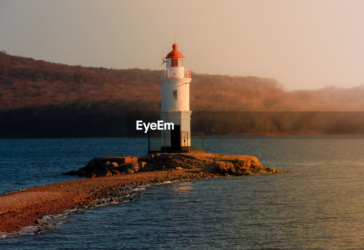 The lighthouse tokarevskaya koshka with vane anemometer in vladivostok, russia