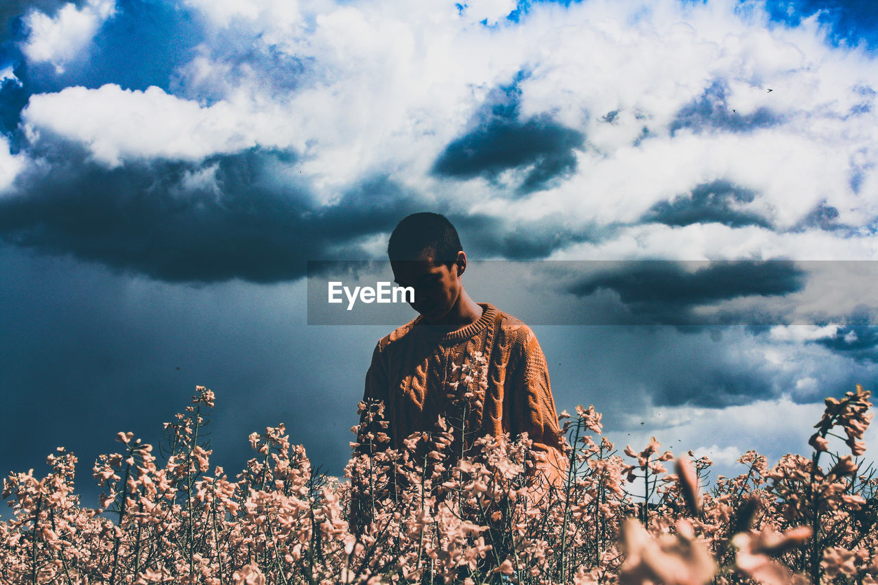  view of woman standing against sky