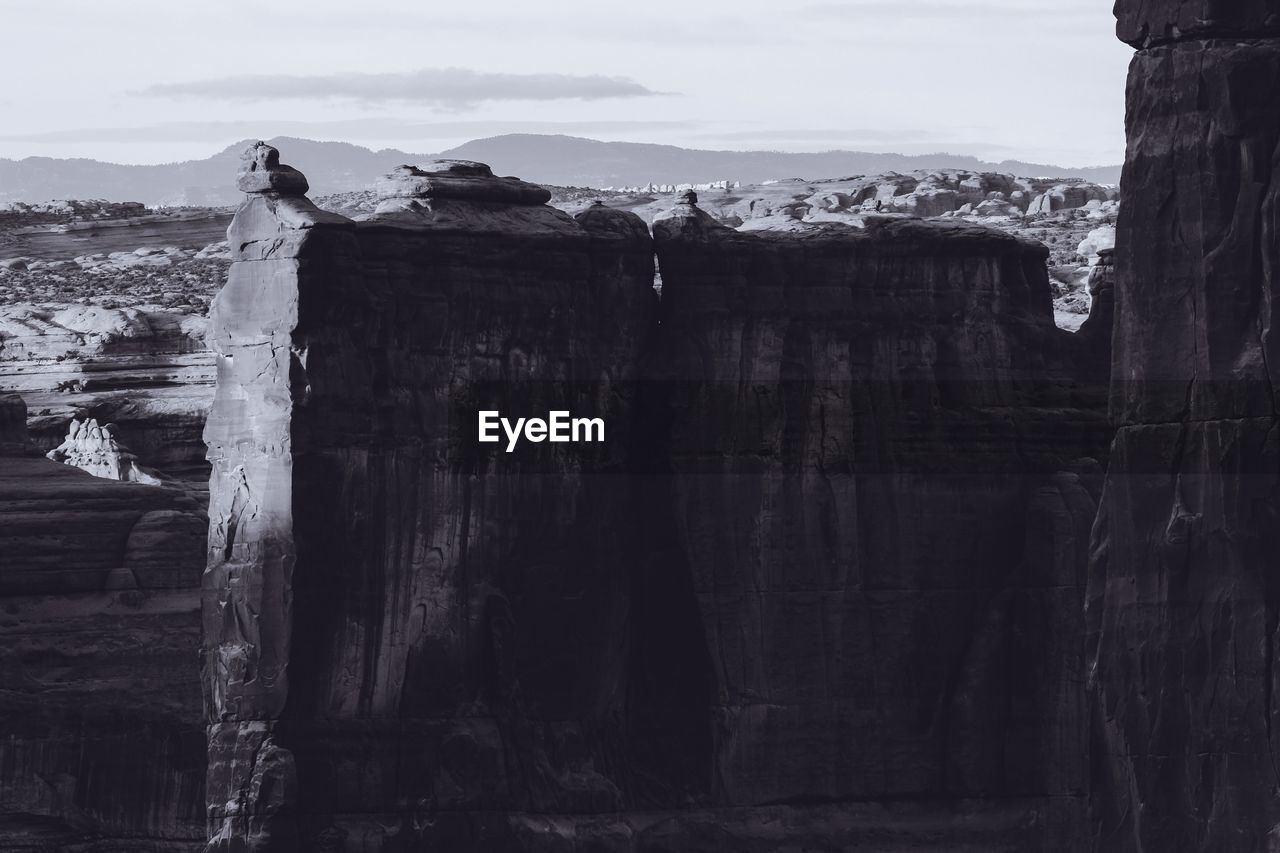 Scenic view of rock formation against sky