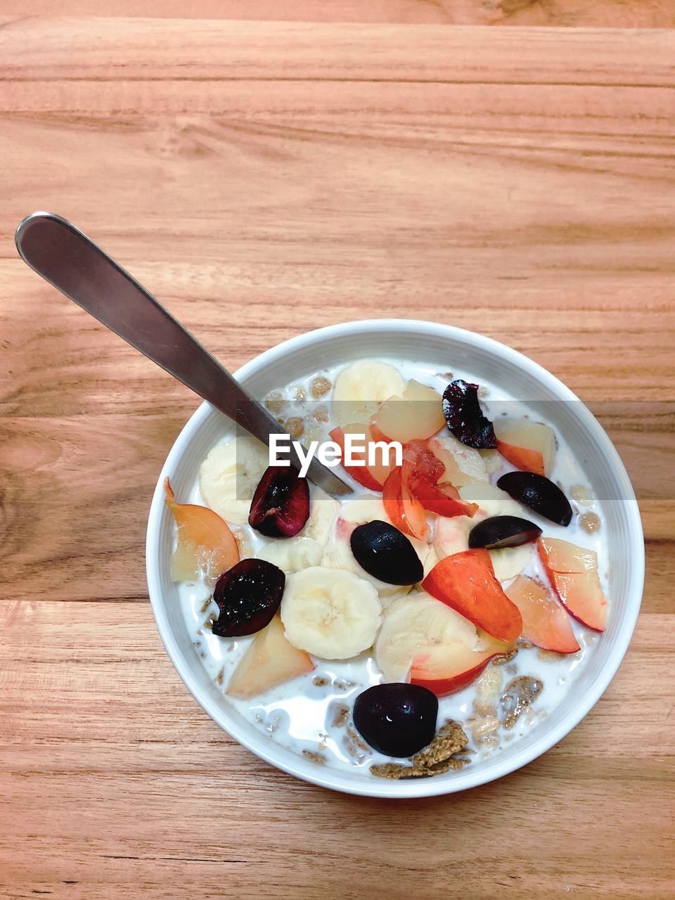 High angle view of breakfast cereal and fruit.