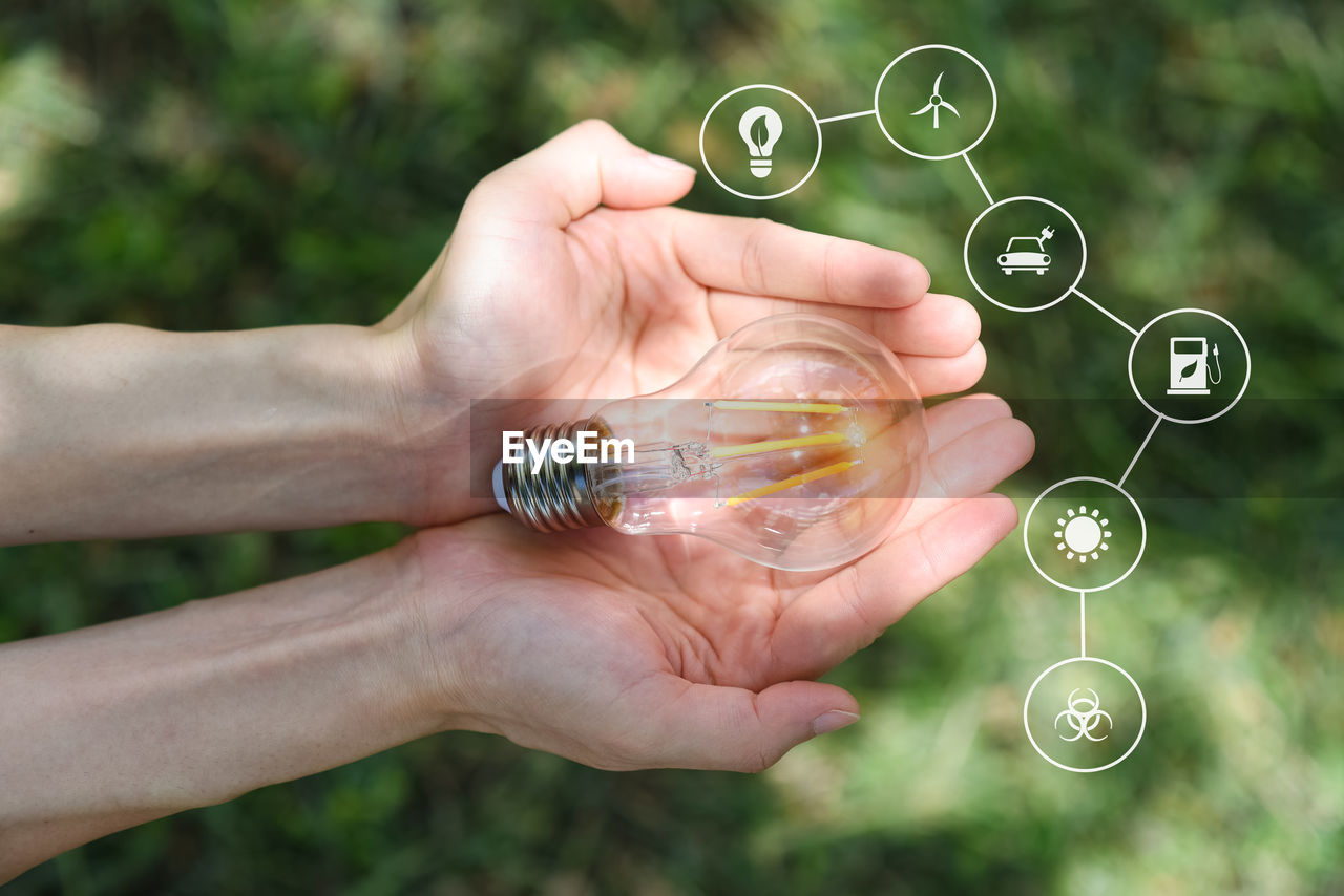 close-up of hand holding crystal ball