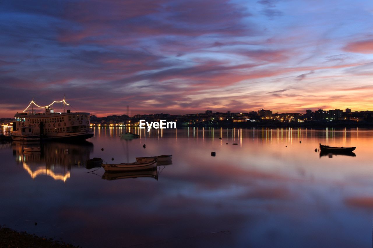 Scenic view of lake against sky during sunset