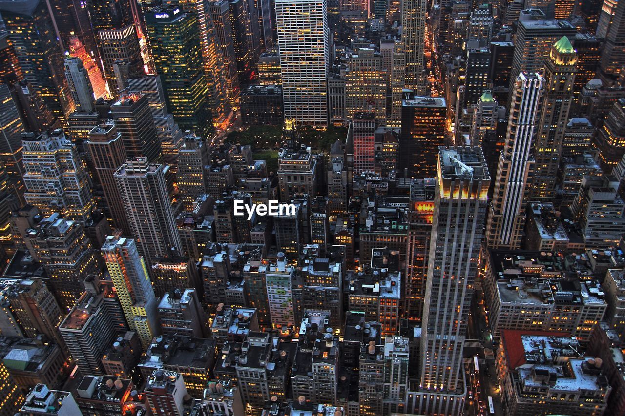 Full frame shot of illuminated cityscape at dusk