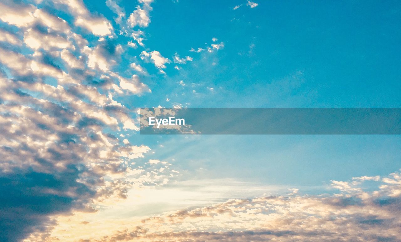 Low angle view of clouds in blue sky