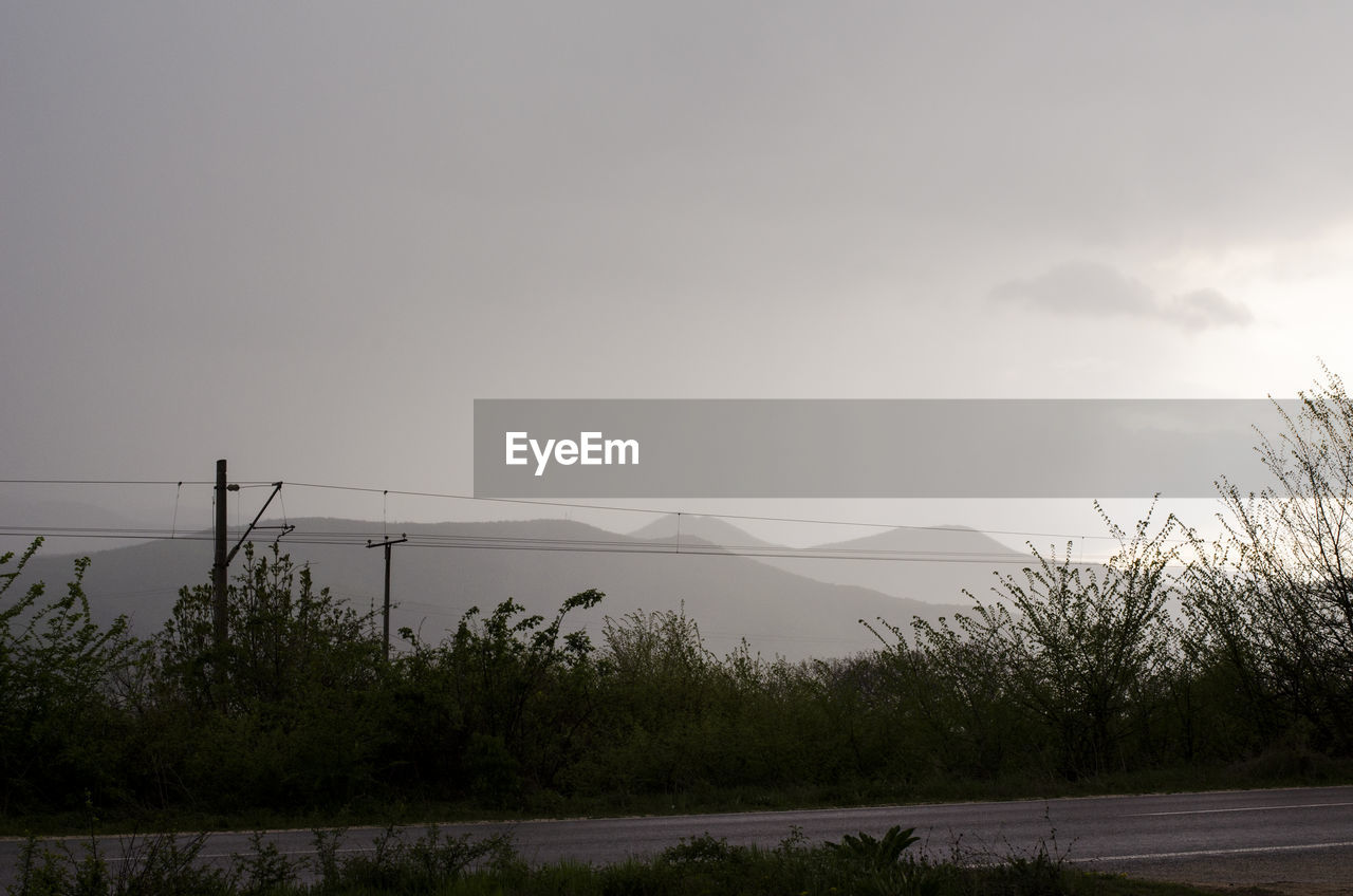 LANDSCAPE WITH SKY IN BACKGROUND