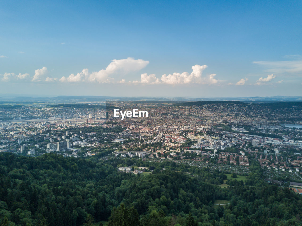 Aerial view of cityscape against sky