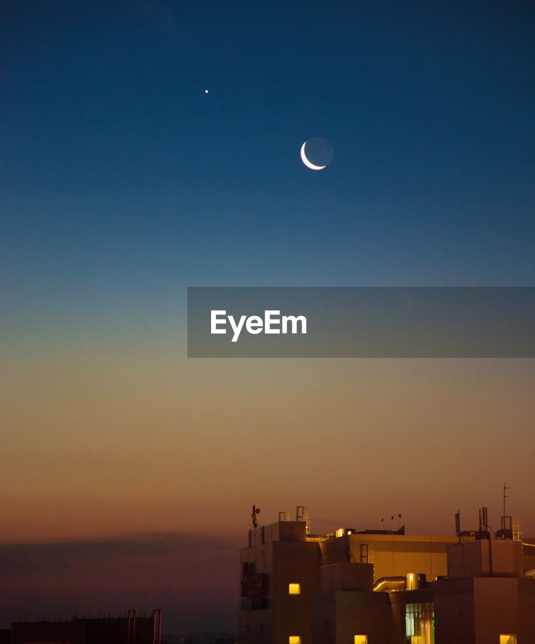 Scenic view of sea against sky at night