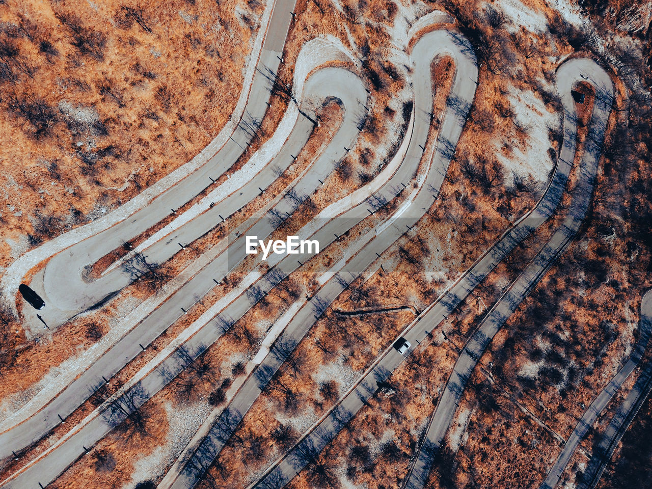 Aerial view of curvy mountain road, valsassina, italy.