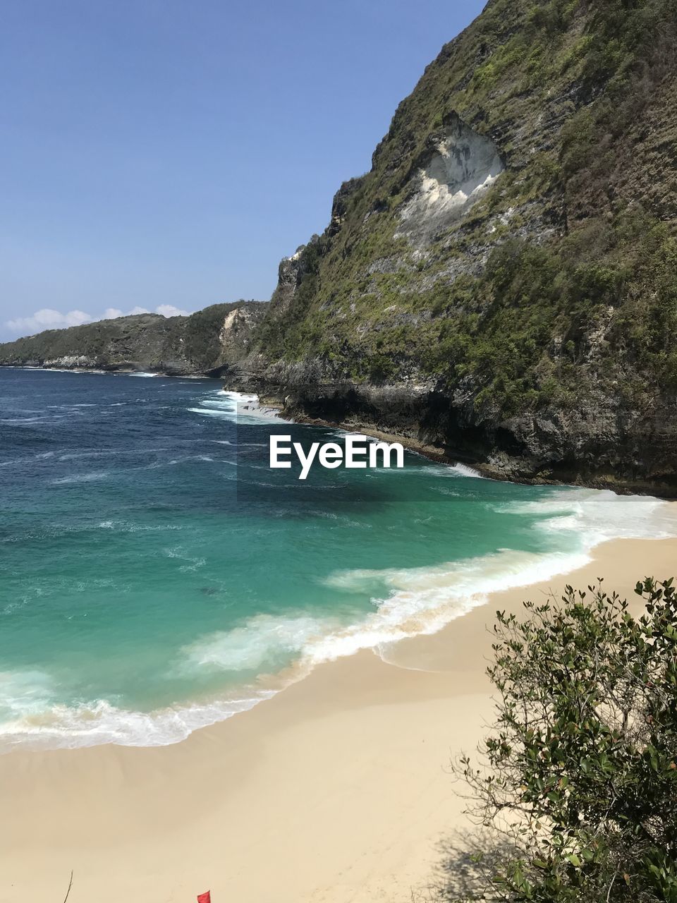 SCENIC VIEW OF BEACH AGAINST CLEAR BLUE SKY