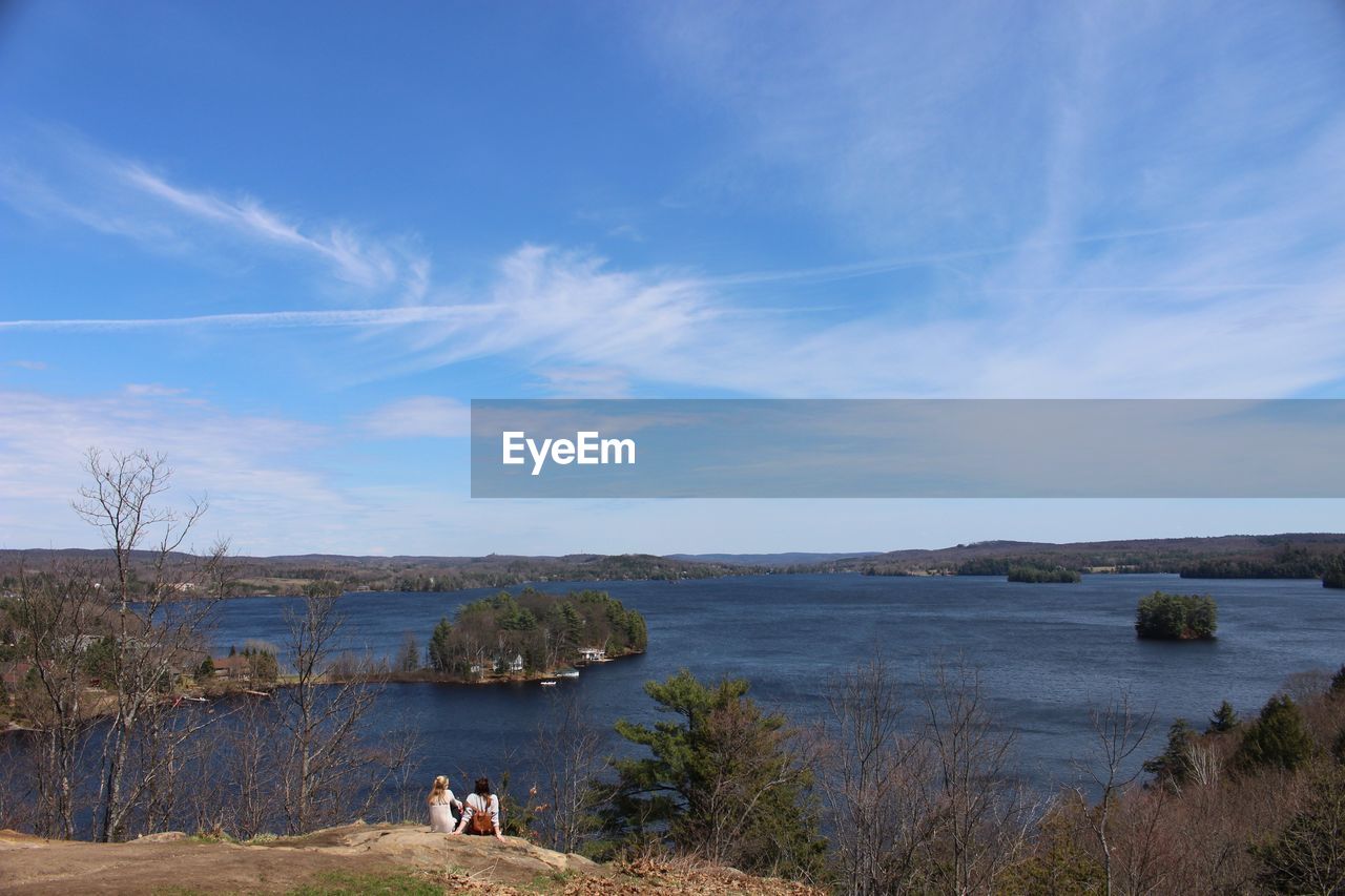 SCENIC VIEW OF LAKE AGAINST BLUE SKY