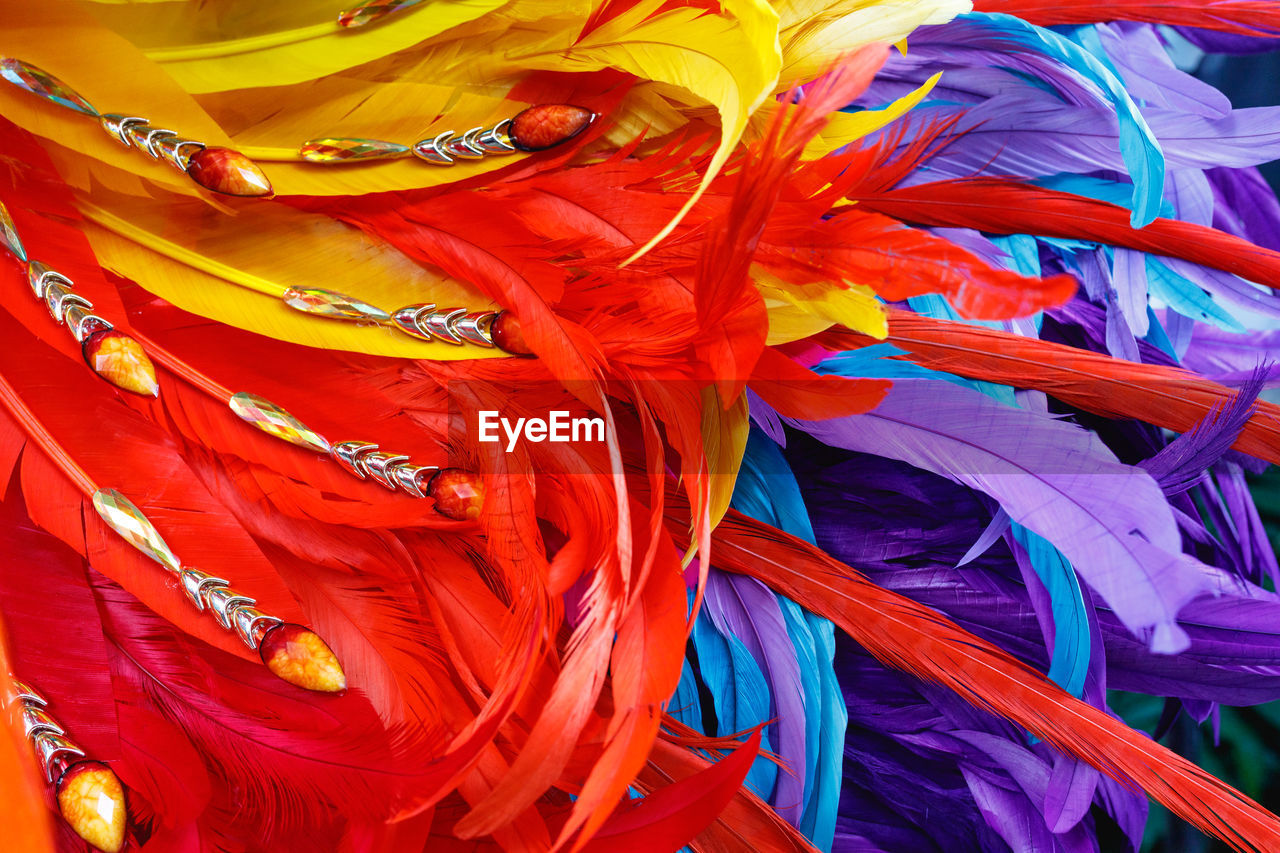 Full frame shot of colorful feathers for sale at market