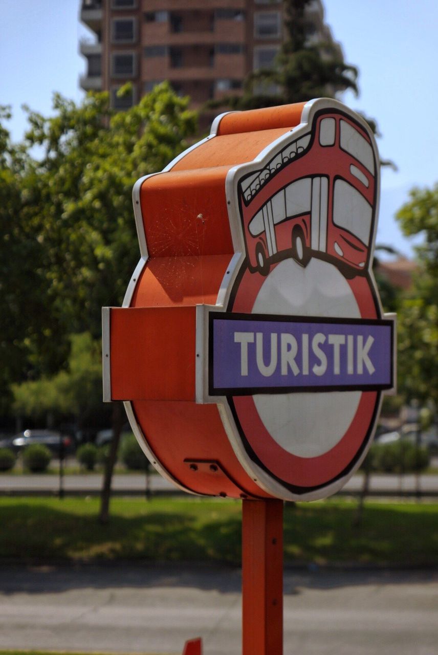 CLOSE-UP OF RED ROAD SIGN