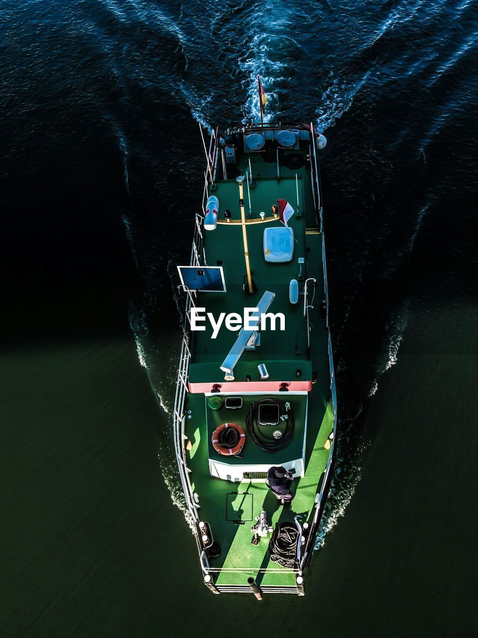 High angle view of boat sailing in sea