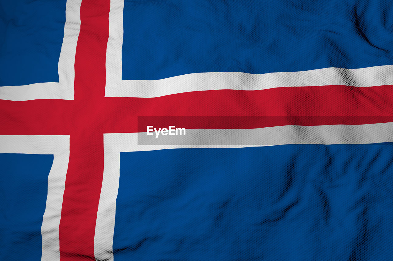 Full frame close-up on a waving flag of iceland in 3d rendering.