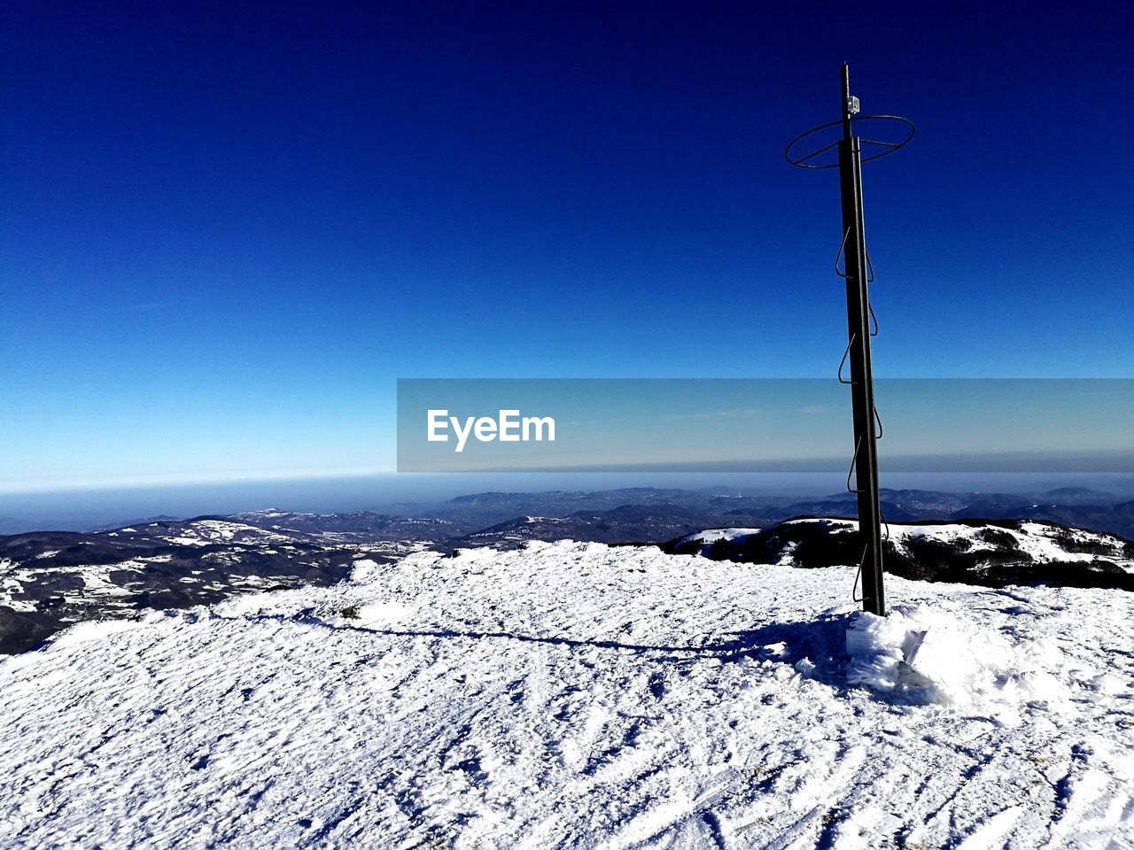 SNOW AGAINST SKY DURING WINTER