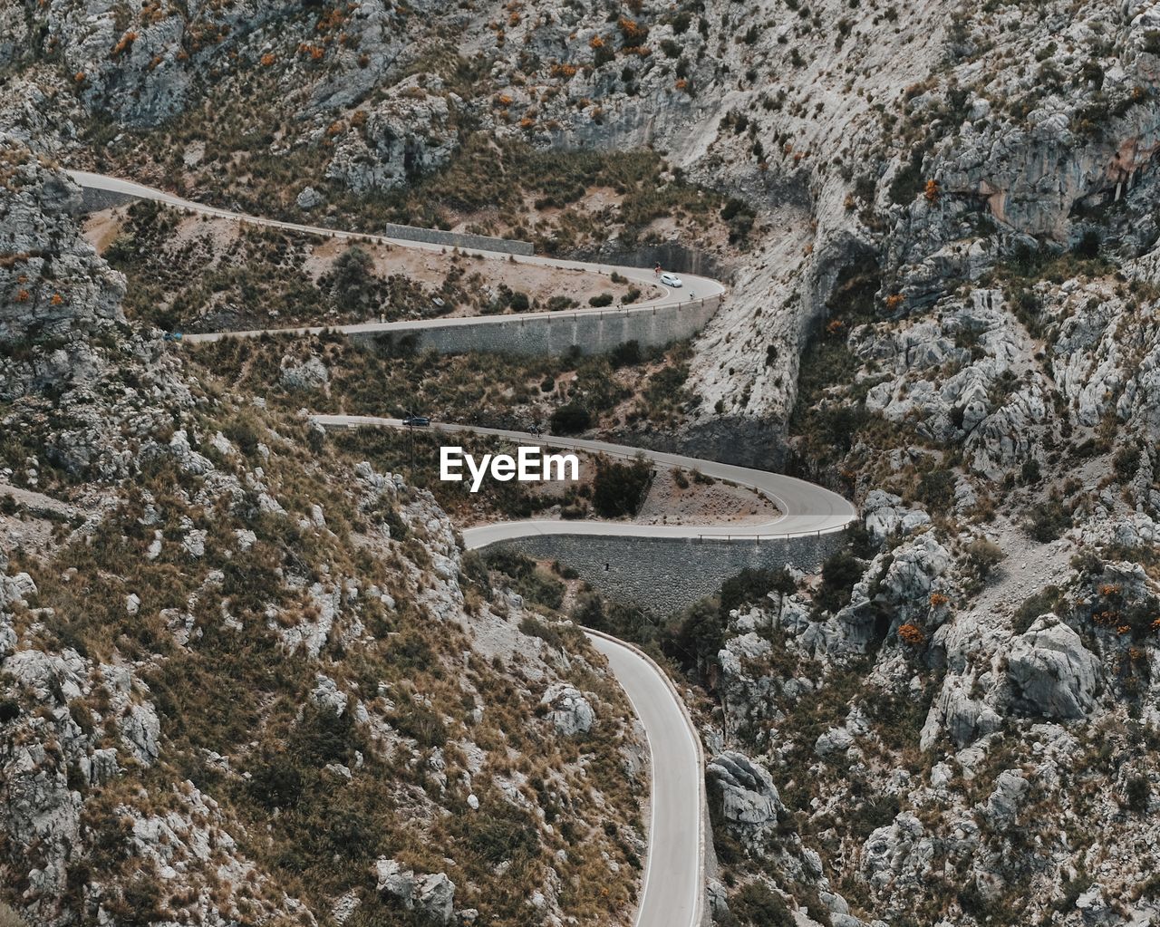 High angle view of road amidst rocks