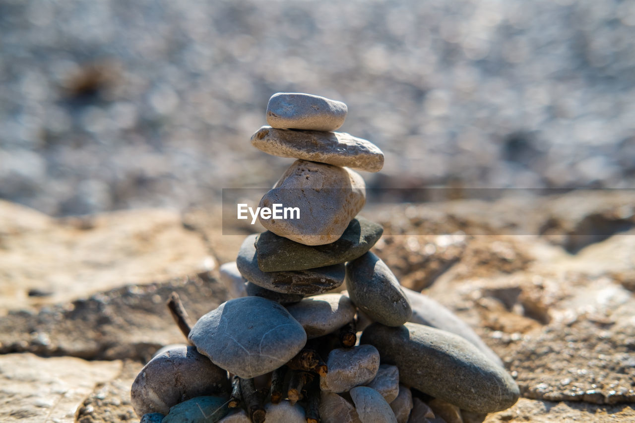 CLOSE-UP OF STONE STACK ON ROCKS