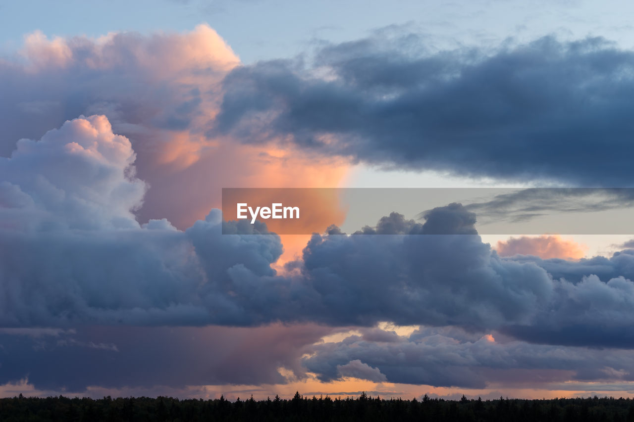 LOW ANGLE VIEW OF DRAMATIC SKY OVER LANDSCAPE