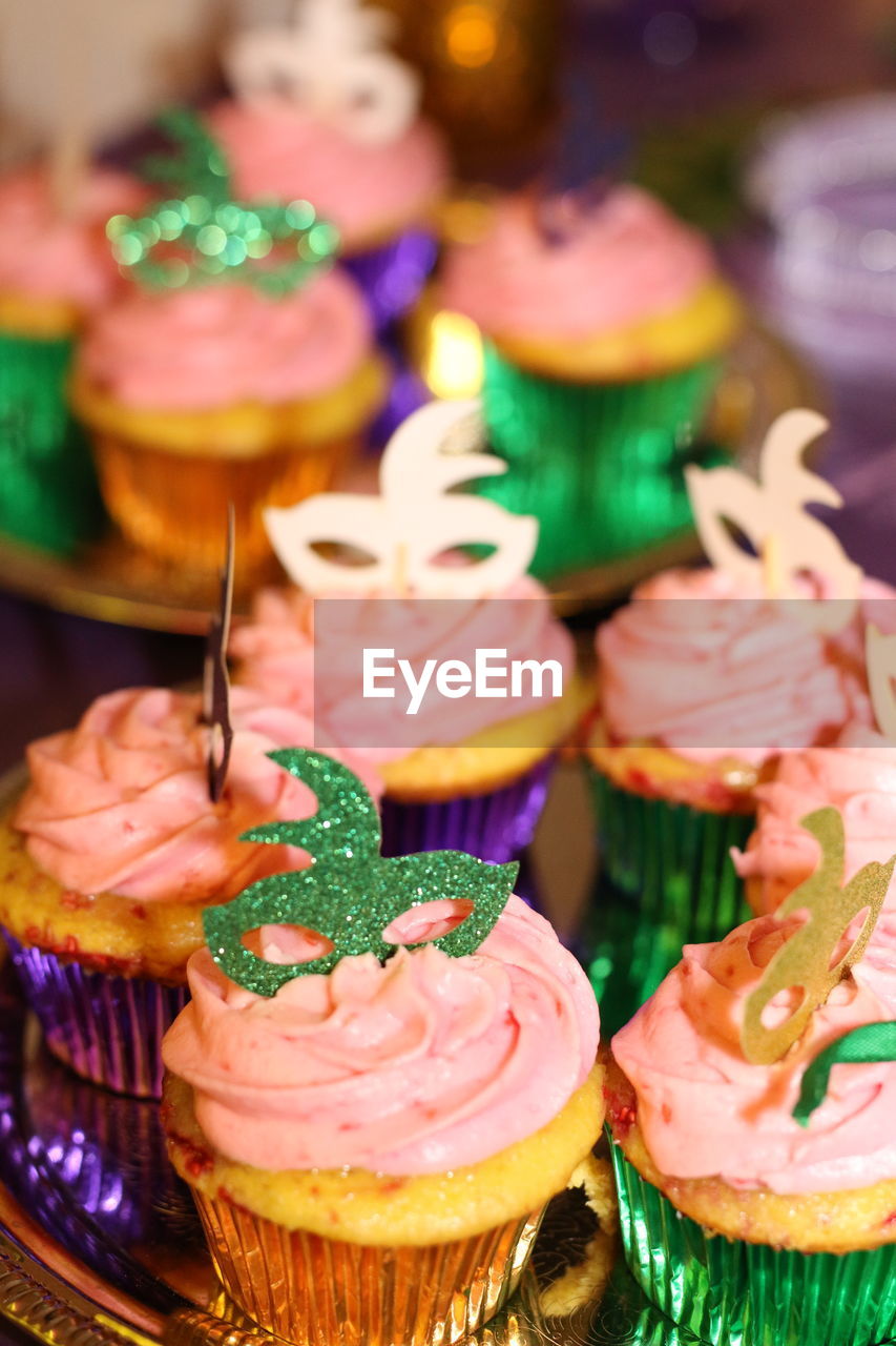 Close-up of mardi gras cupcakes