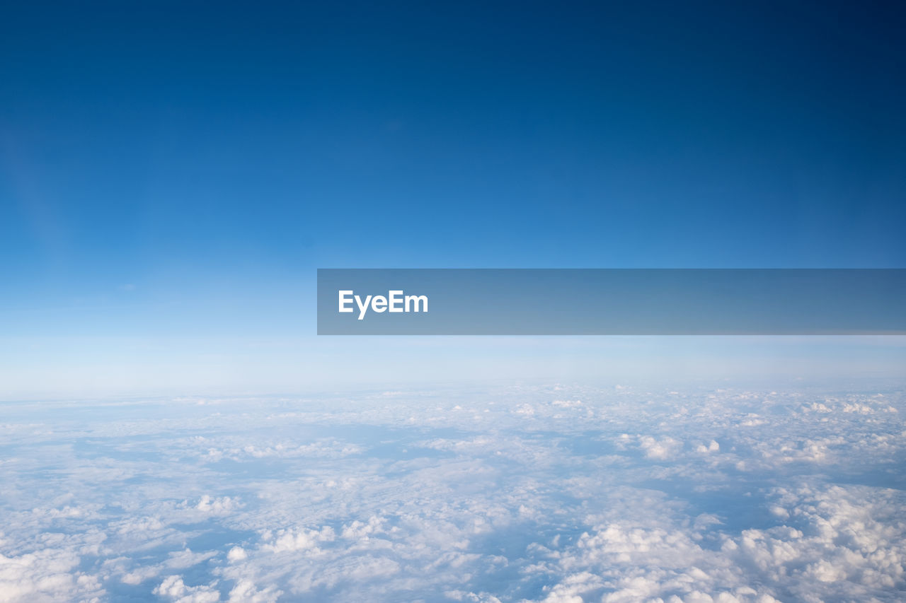 Aerial view of cloudscape against blue sky