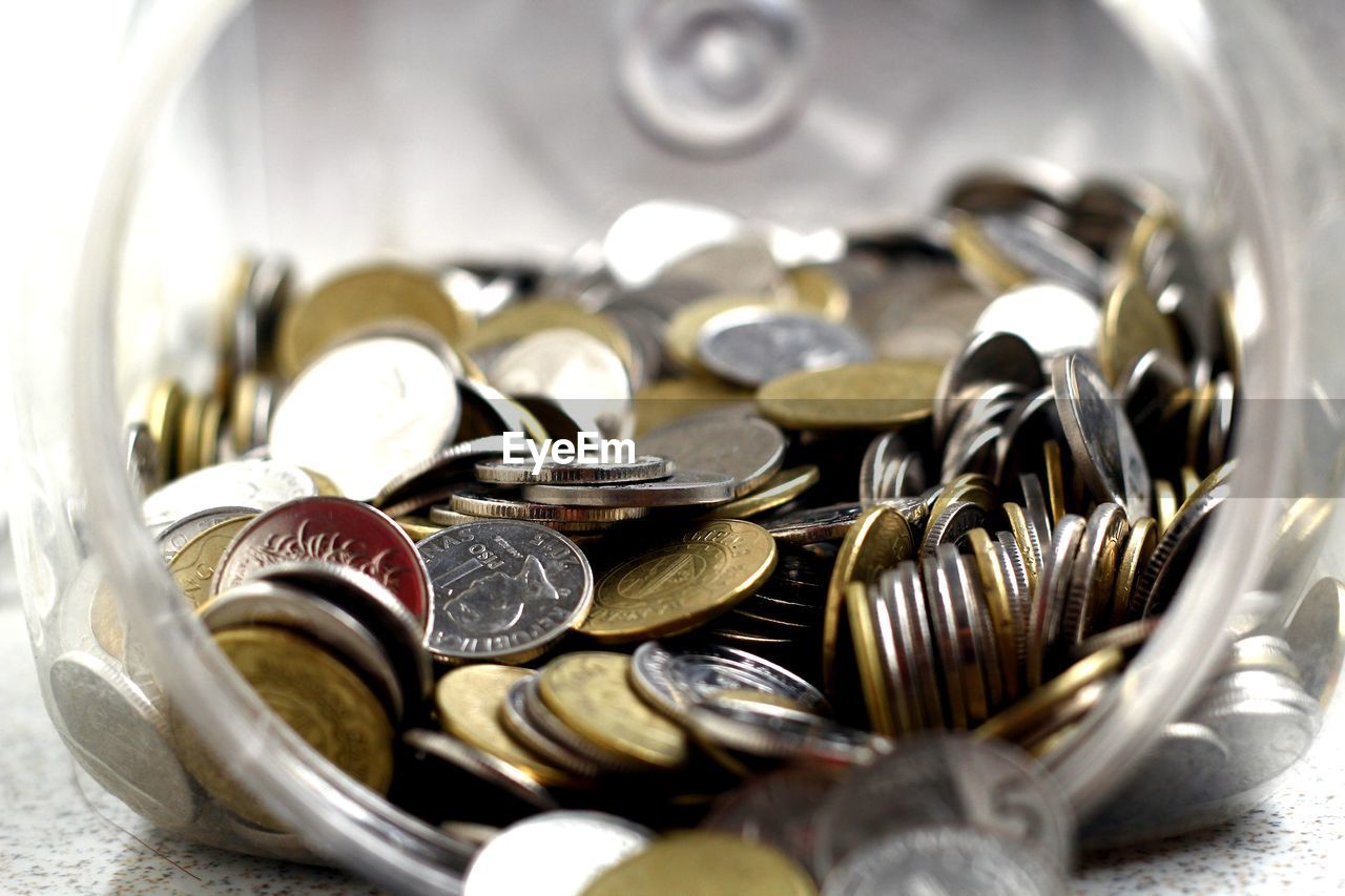 Close-up of coins on table