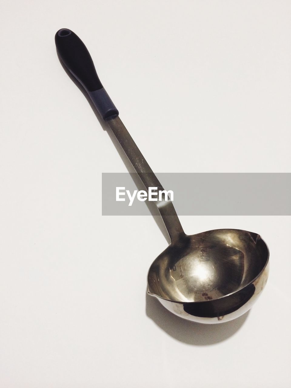 High angle view of spoon over white background