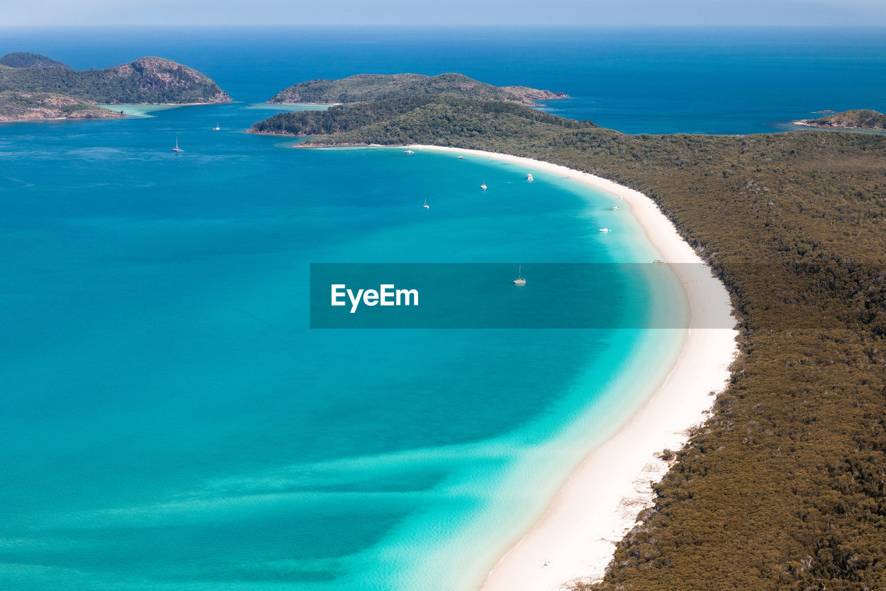 High angle view of beach against blue sky