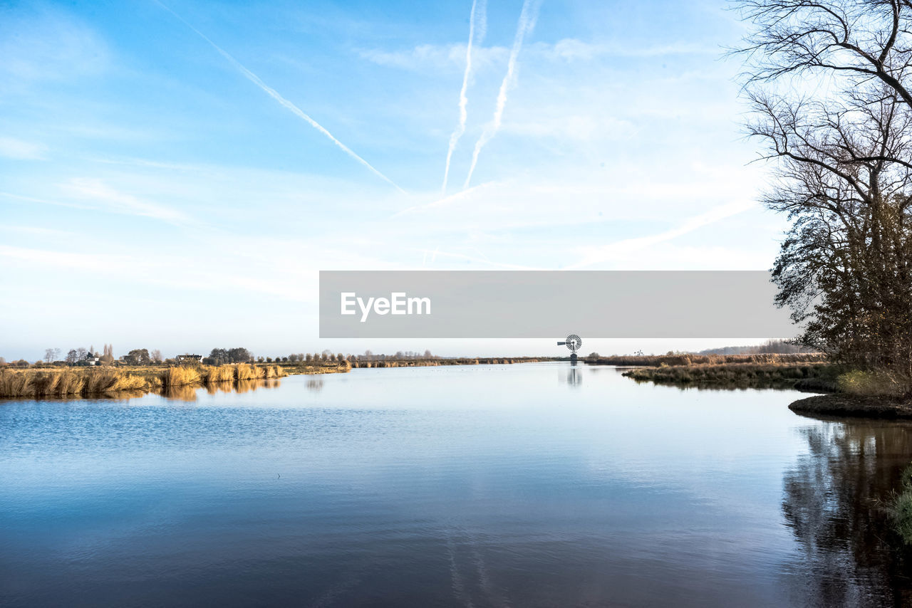 VIEW OF LAKE AGAINST SKY