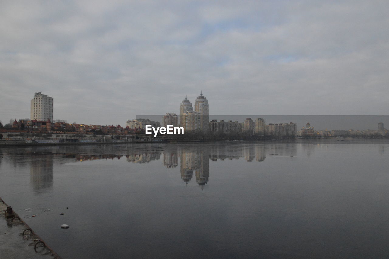 REFLECTION OF BUILDINGS ON WATER