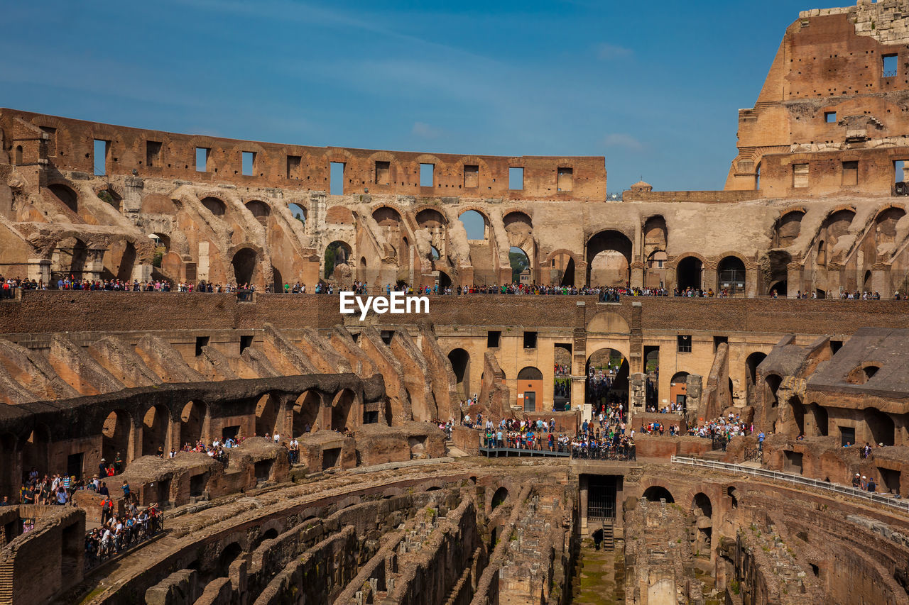 View of the seating areas and the hypogeum of the ancient colosseum in rome