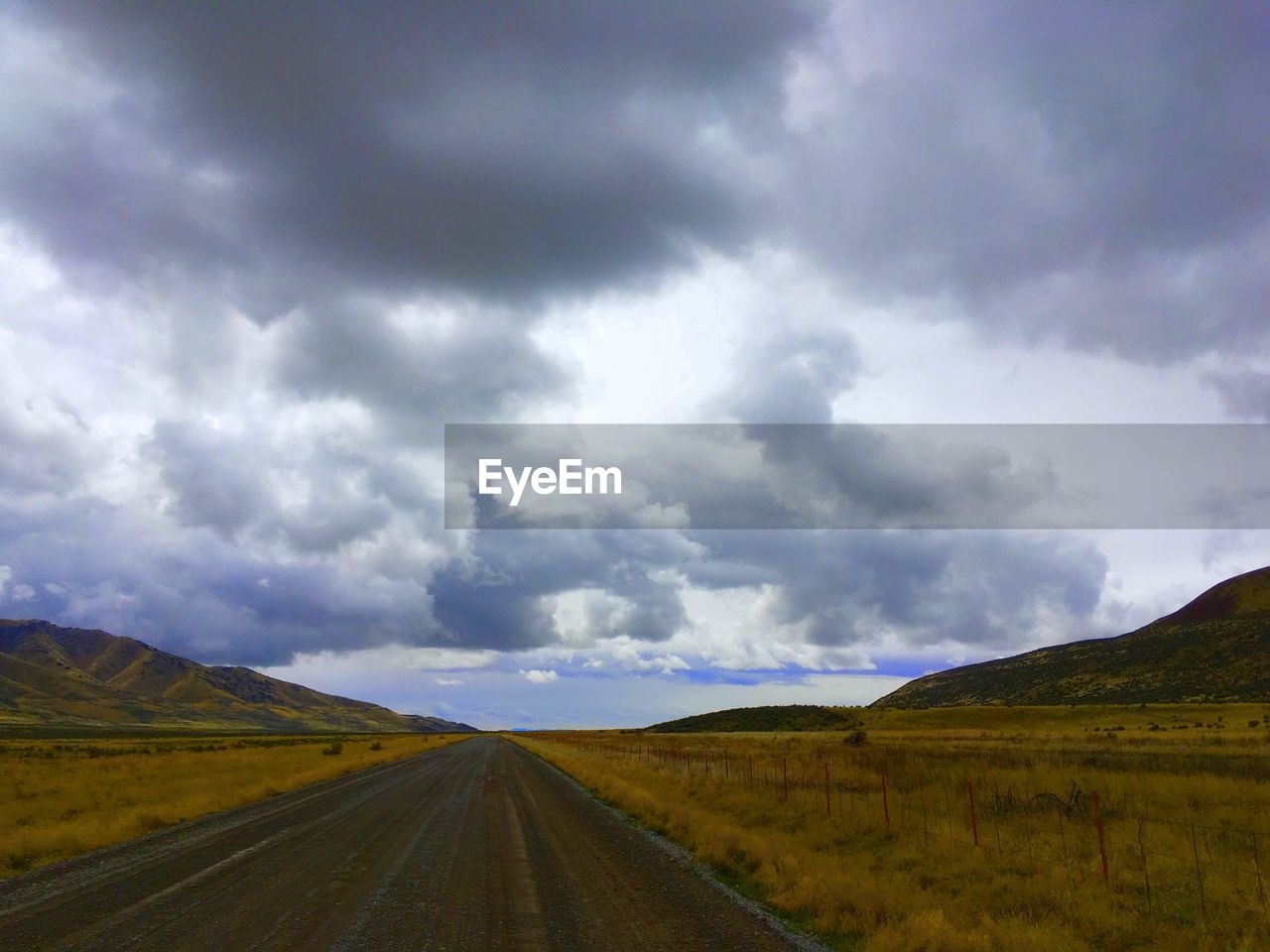 EMPTY ROAD ALONG LANDSCAPE