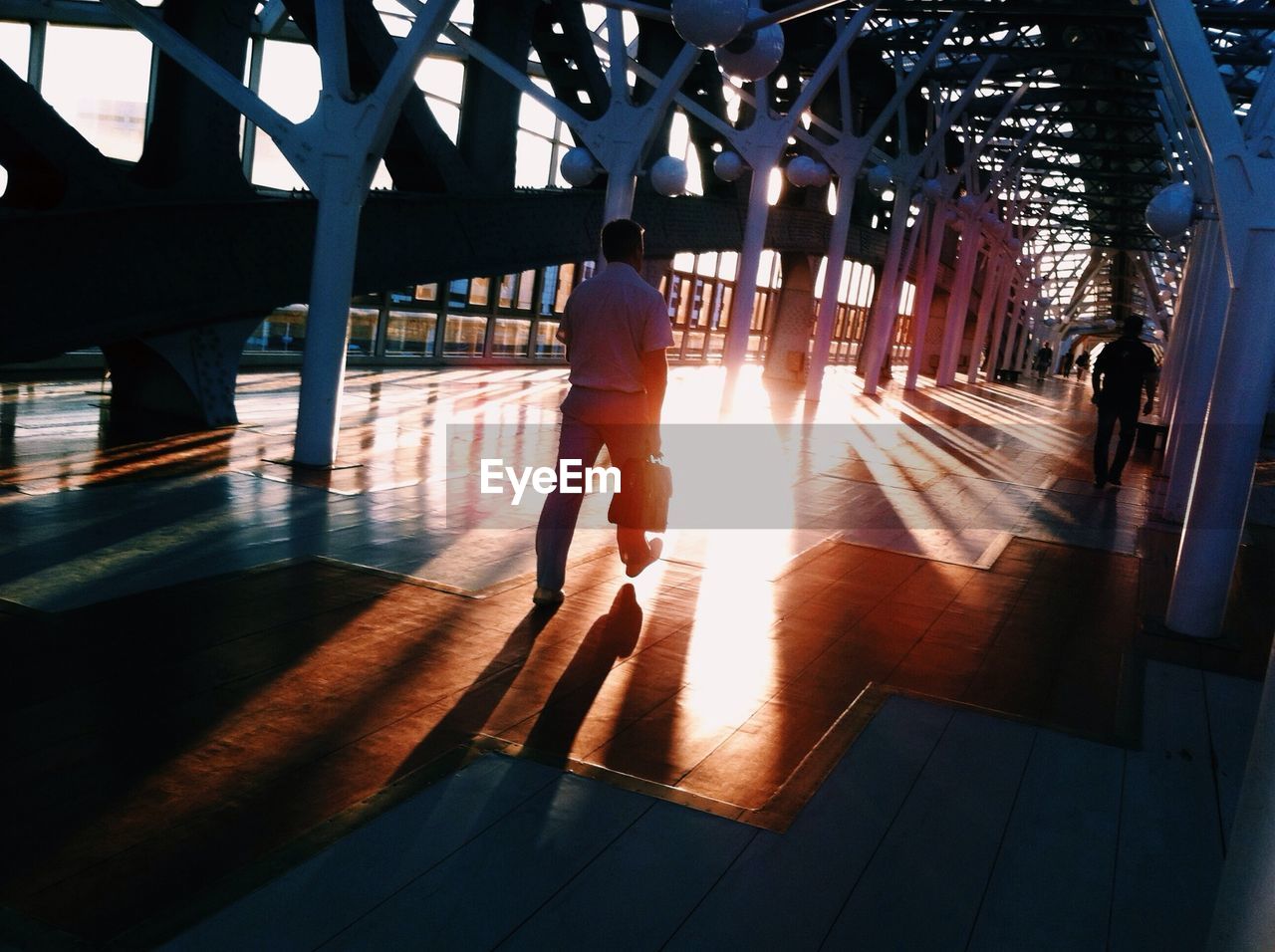 Man carrying suitcase