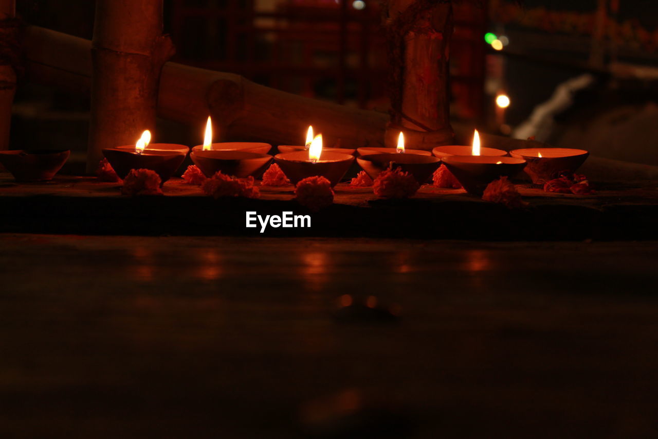 Lit diyas at night