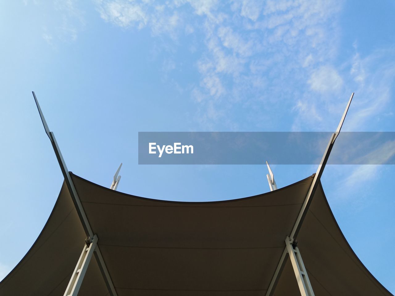 Low angle view of roof against sky