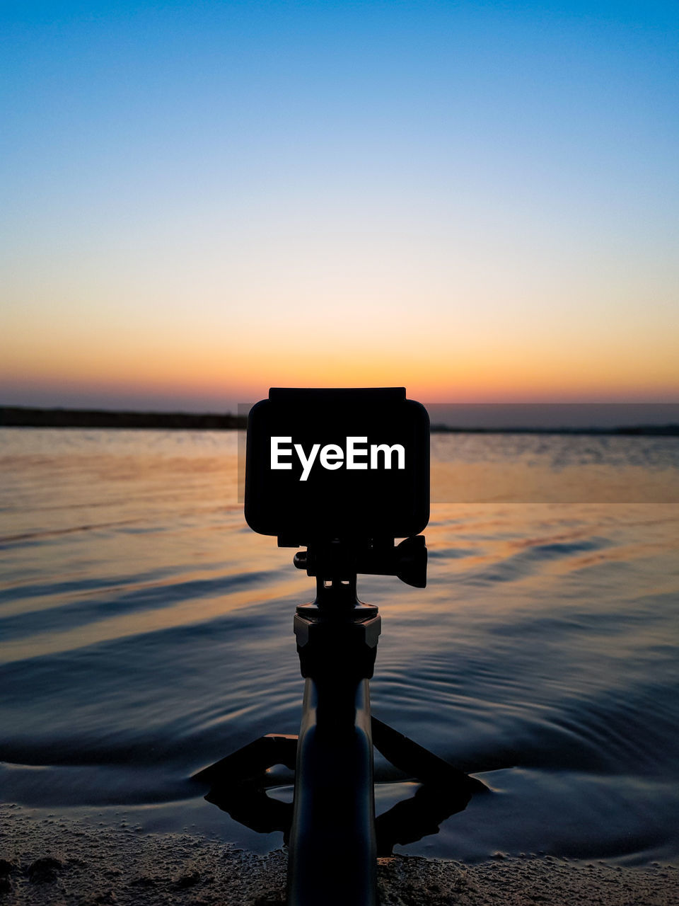 SCENIC VIEW OF SEA AGAINST ORANGE SKY