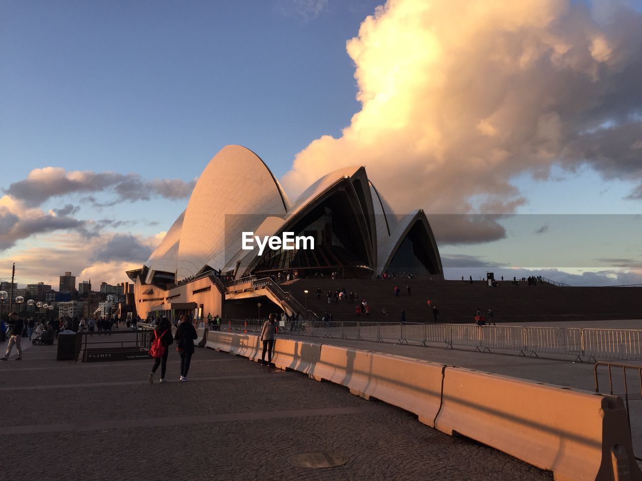 TOURISTS AT SUNSET