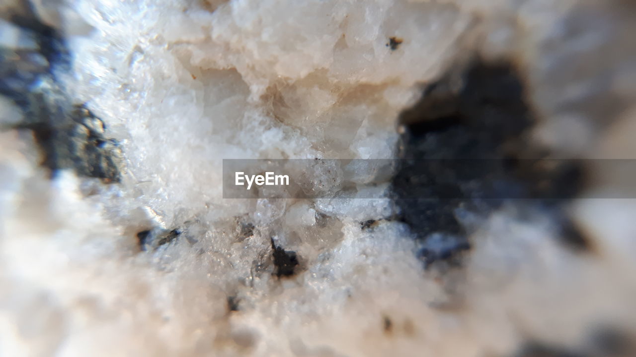 FULL FRAME SHOT OF FROZEN ICE