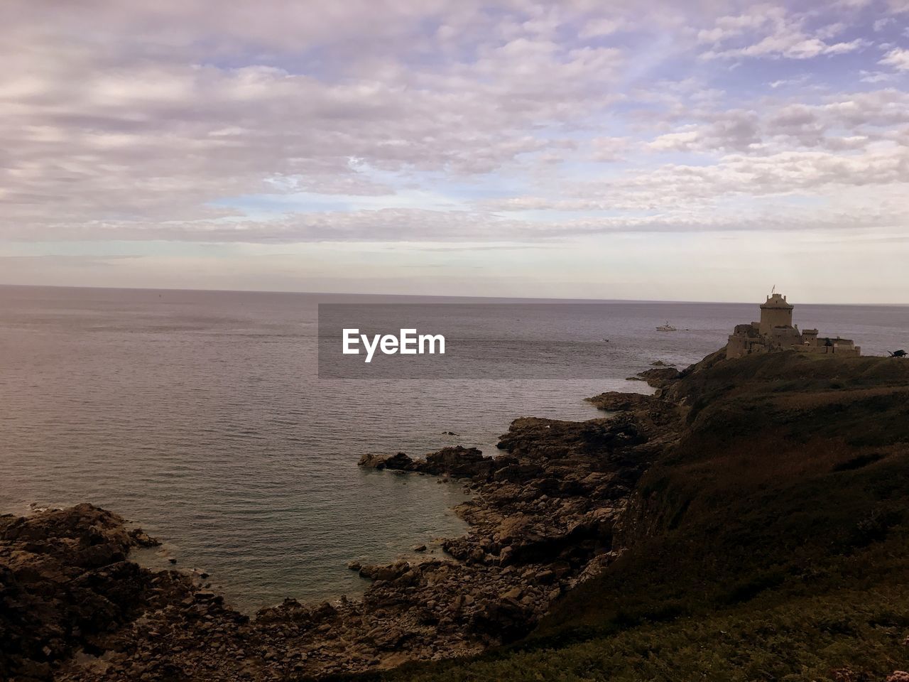 View of sea against cloudy sky