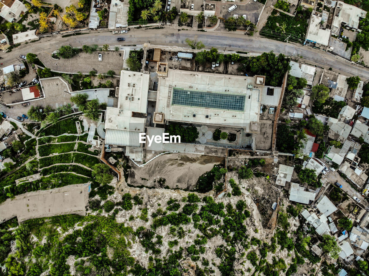 HIGH ANGLE VIEW OF TREES BY BUILDING IN CITY