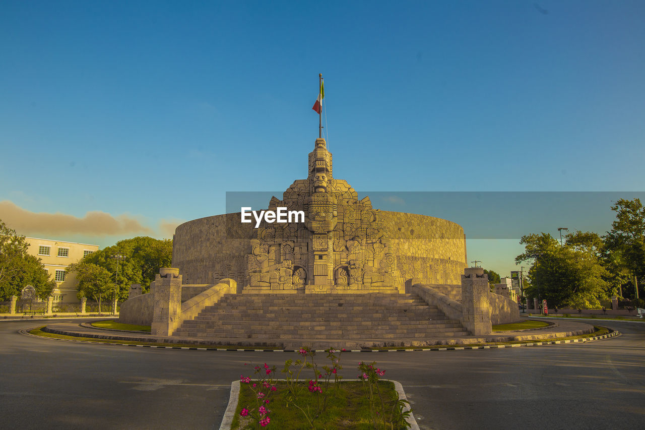 low angle view of historical building against clear blue sky