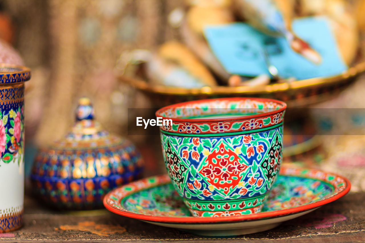 Close-up of antique cup for sale at market