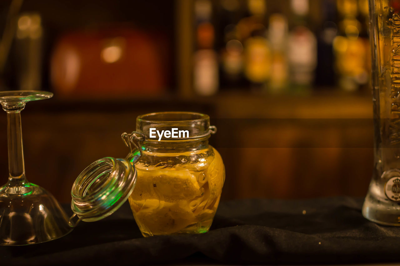 Close-up of drink in glass jar on table