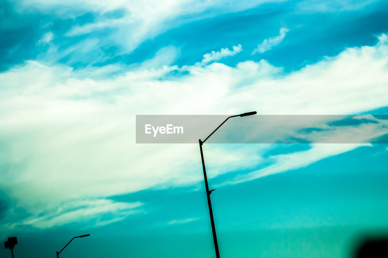 LOW ANGLE VIEW OF CLOUDY SKY OVER THE BACKGROUND