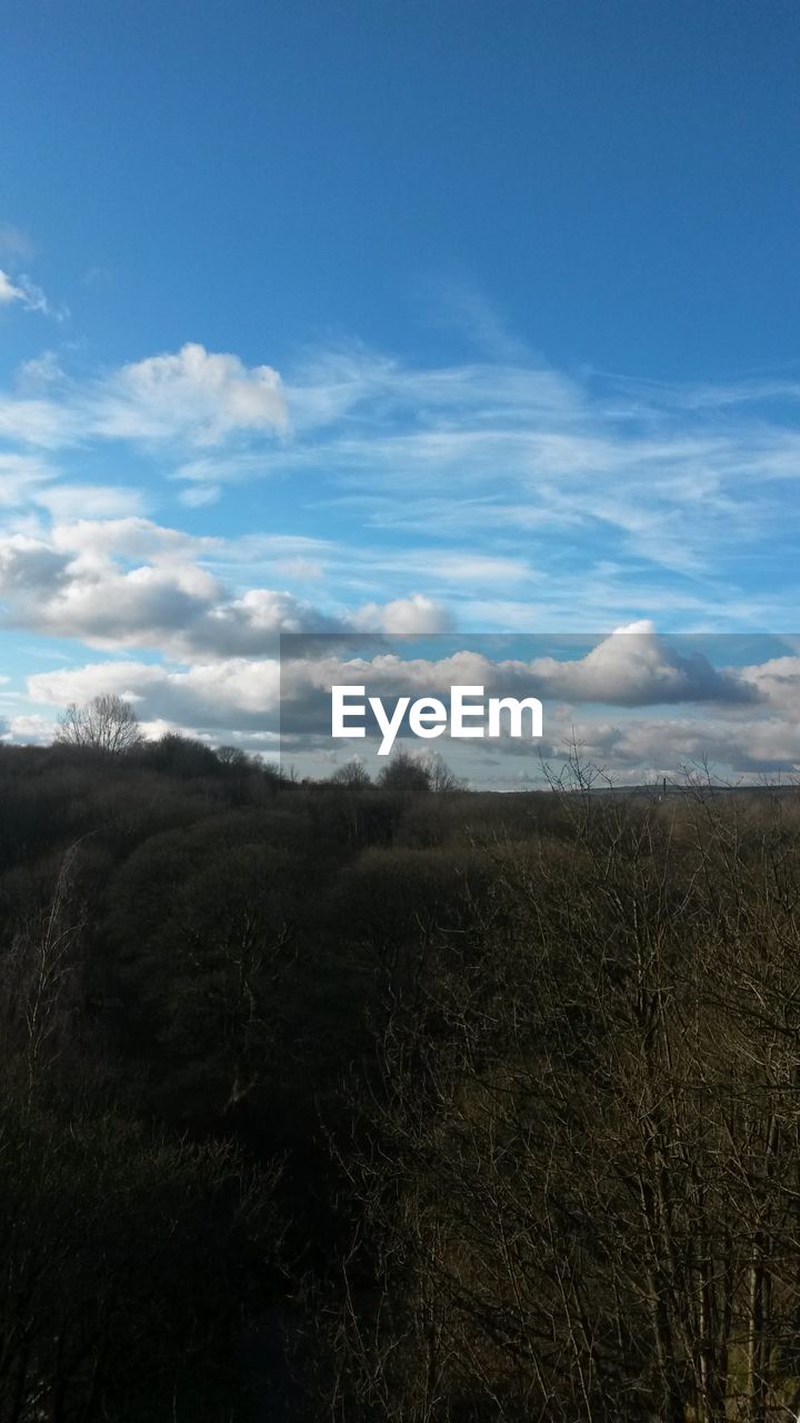 VIEW OF LANDSCAPE AGAINST CLOUDY SKY