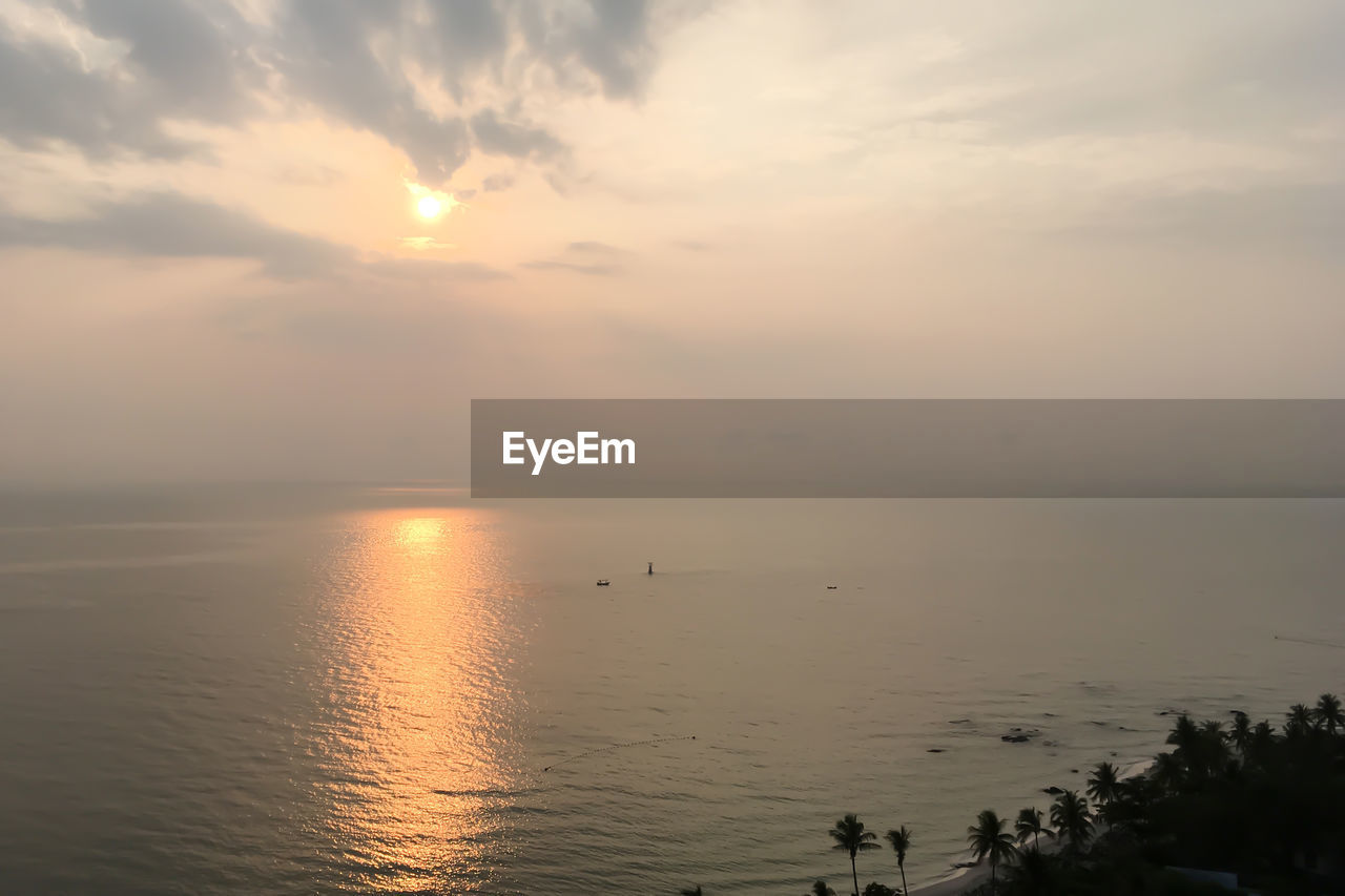 SCENIC VIEW OF SEA DURING SUNSET