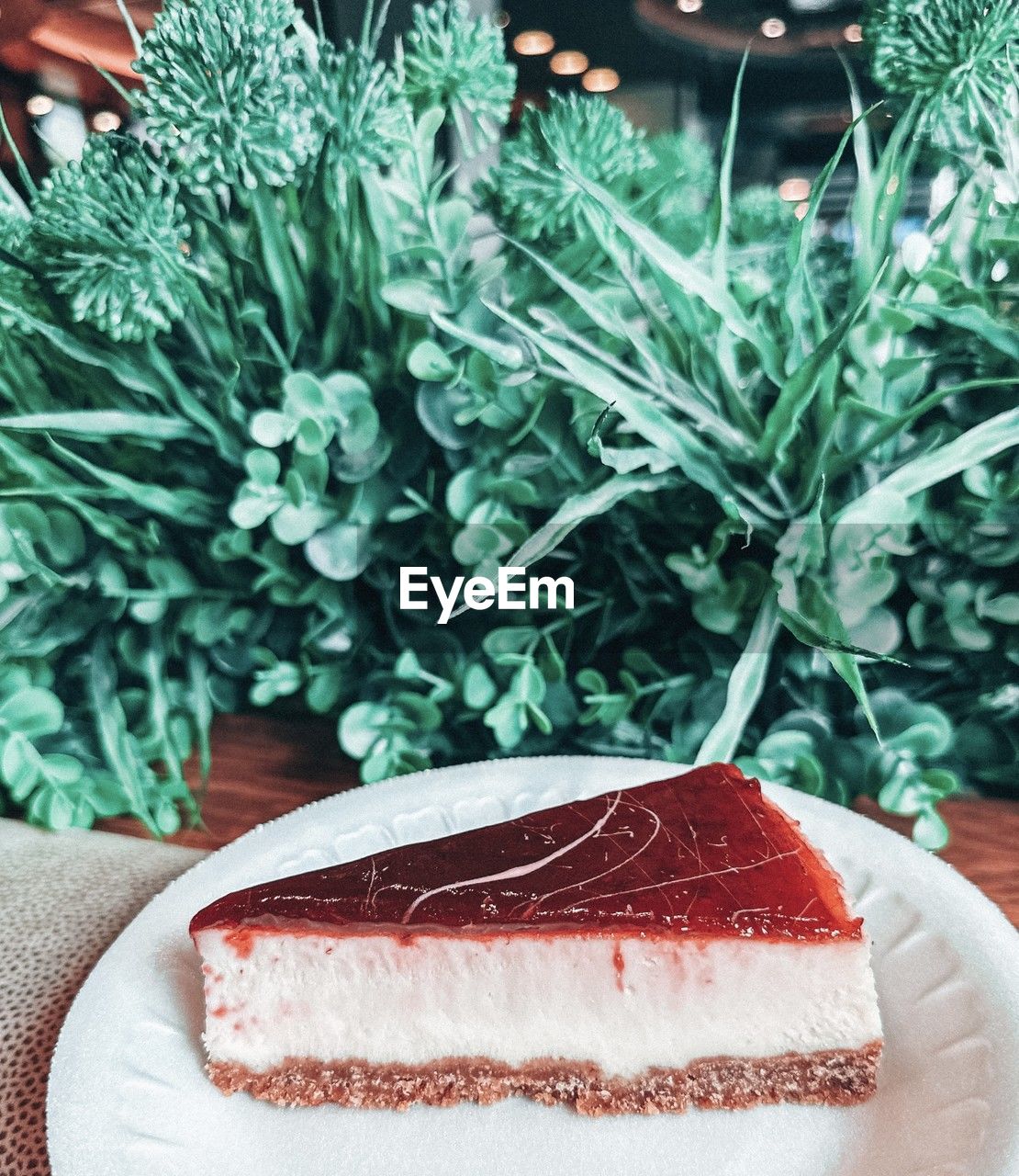 food, food and drink, cake, birthday cake, freshness, plant, sweet food, plate, dessert, baked, icing, strawberry, sweet, celebration, produce, healthy eating, fruit, chocolate cake, indoors, green, leaf, table, nature, no people, sponge cake