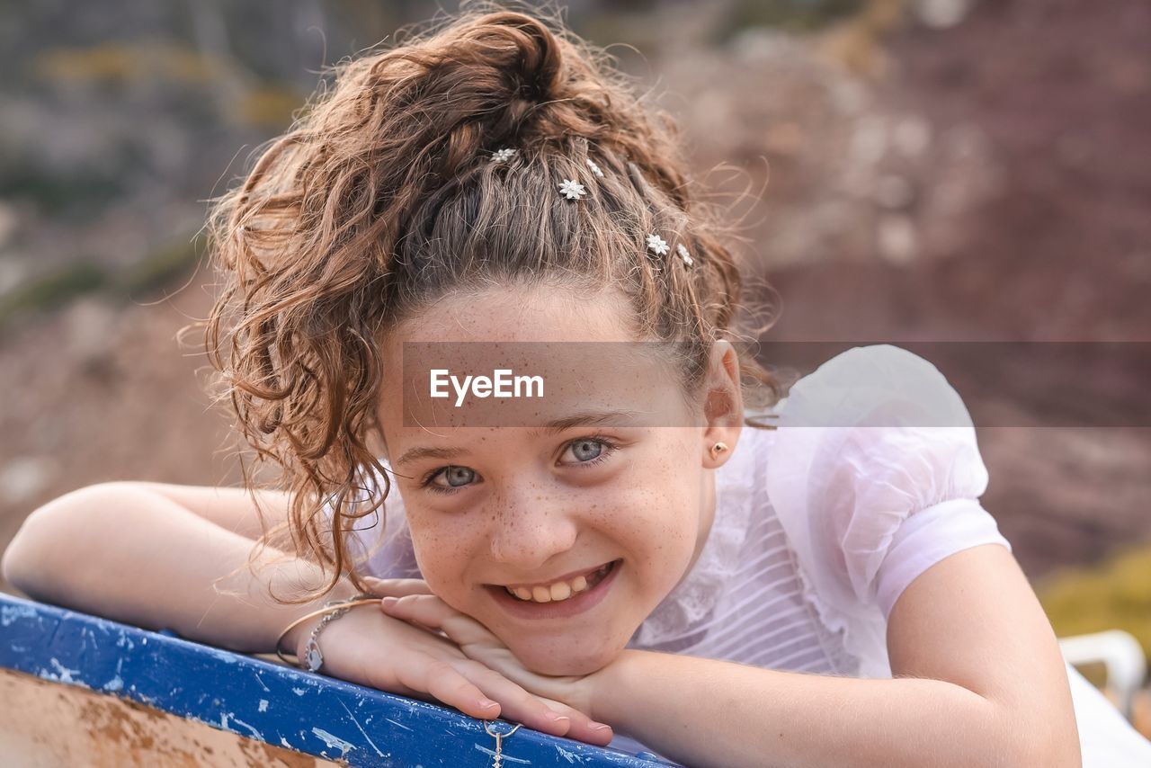 Close-up portrait of smiling girl